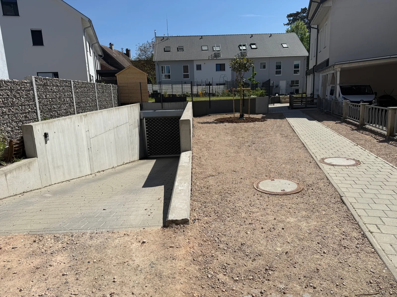 Neubau von 7 Reihenhäusern & Tiefgarage – Ansicht 1